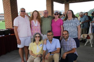Members of IT-GPS posing together at the 2025 summer picnic. Front row, left to right: Renee Gray, Deepak Bhatnagar, and Tajinder Singh. Back row, left to right: Carl Harris, Megan Stewards, Kyle Johnson, Karen Herrington, and Lisa Sedlak.