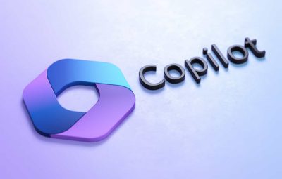 Microsoft Copilot logo displayed in blue and purple beside the word “Copilot” on a light background.
