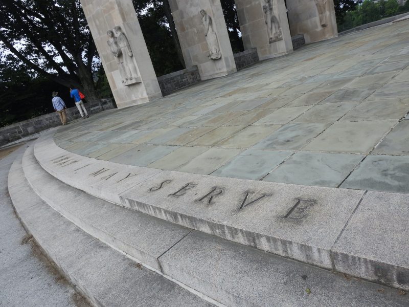 large stone steps and plaza with "that I may serve" etched into top step