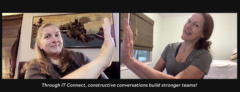 two people side-by-side in video meeting giving virtual high-five