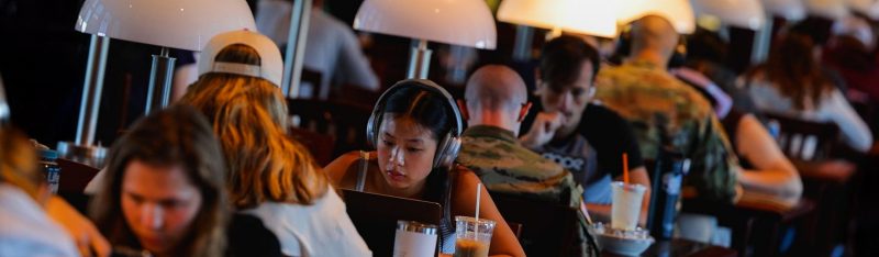 Students doing classwork on Torgersen Bridge