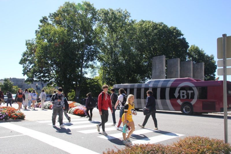 Students walking on campus in summer